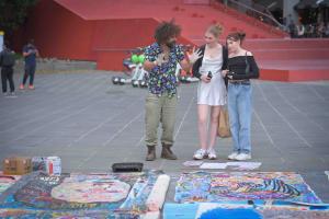 Busking artist on promenade