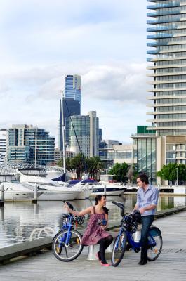 Couple cycling at Yarra s Edge